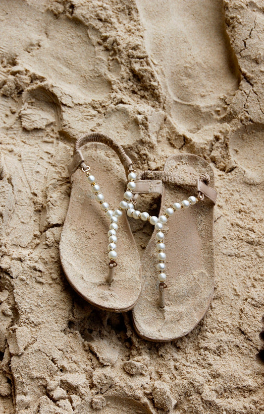 Strictly Influential: Sandals in the sand Banner