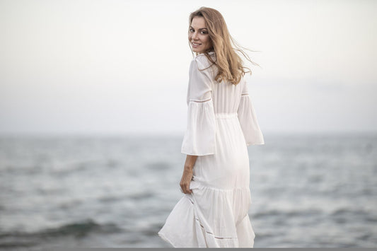 Strictly Influential: Woman in a dress at the sea Banner