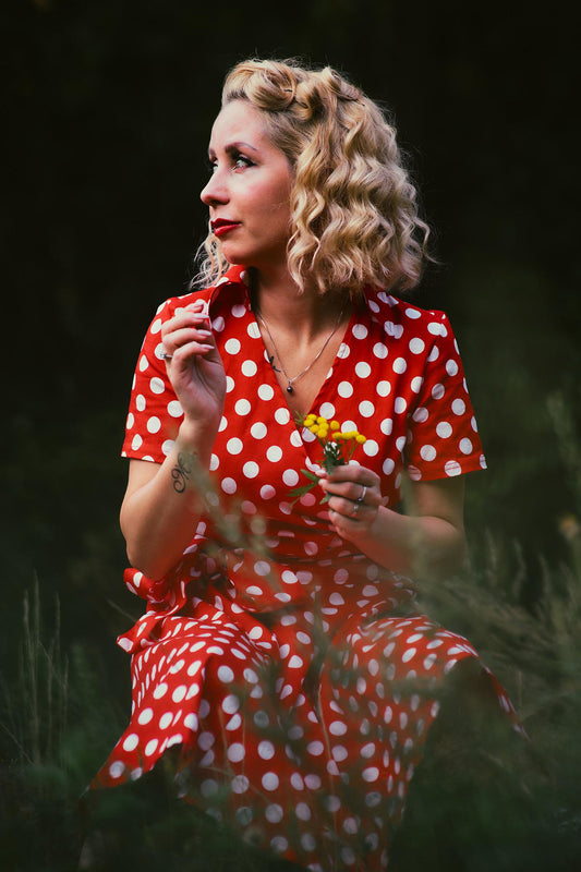 Strictly Influential: Woman with a red dress and white dots Banner