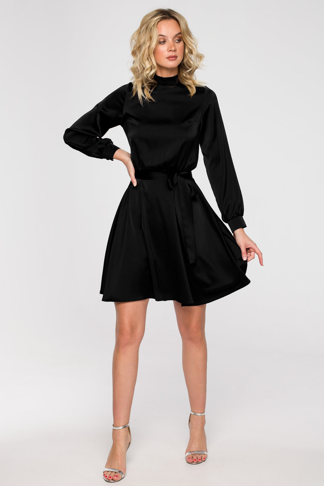 High-Neck Black Satin Mini Dress Tie Detail | Strictly In | Make a statement in our versatile mini dress with a high neck, flared cut, and bishop sleeves. Perfect for turning heads at festive gatherings.