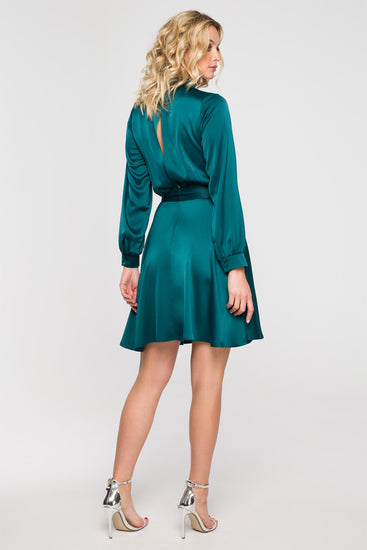 High-Neck Green Satin Mini Dress Tie Detail | Strictly In | Make a statement in our versatile mini dress with a high neck, flared cut, and bishop sleeves. Perfect for turning heads at festive gatherings.