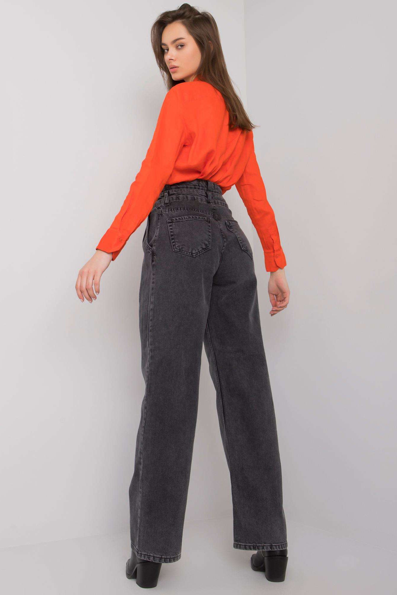 Step into fashion-forward style with our High-Waisted Wide-Leg Jeans. These jeans effortlessly embrace the wide-leg trend while providing comfort and a flattering high-waisted design. Elevate your fashion game with this timeless yet on-trend addition to your wardrobe.