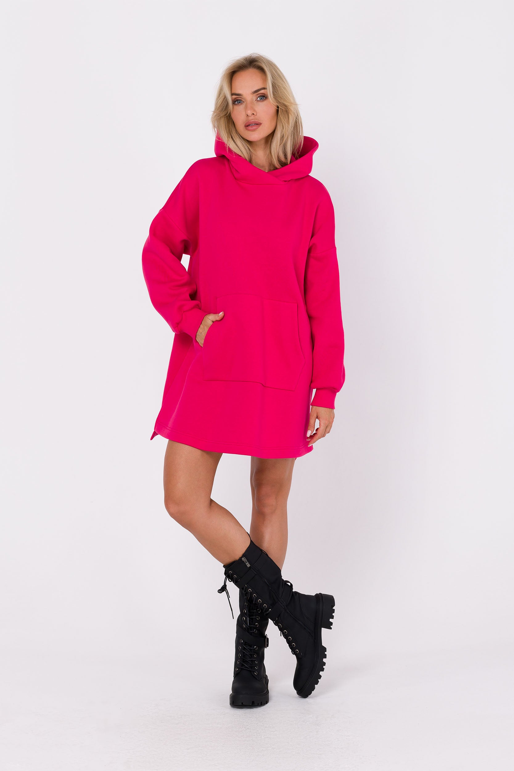 Hooded Sweatshirt Dress Mini | Strictly In | Embrace laid-back style with our Hooded Mini Sweatshirt Dress. Crafted for comfort, this knit tunic dress features a hood, kangaroo pocket, and side splits. Ideal for casual outings, wear it with sneakers or boots.