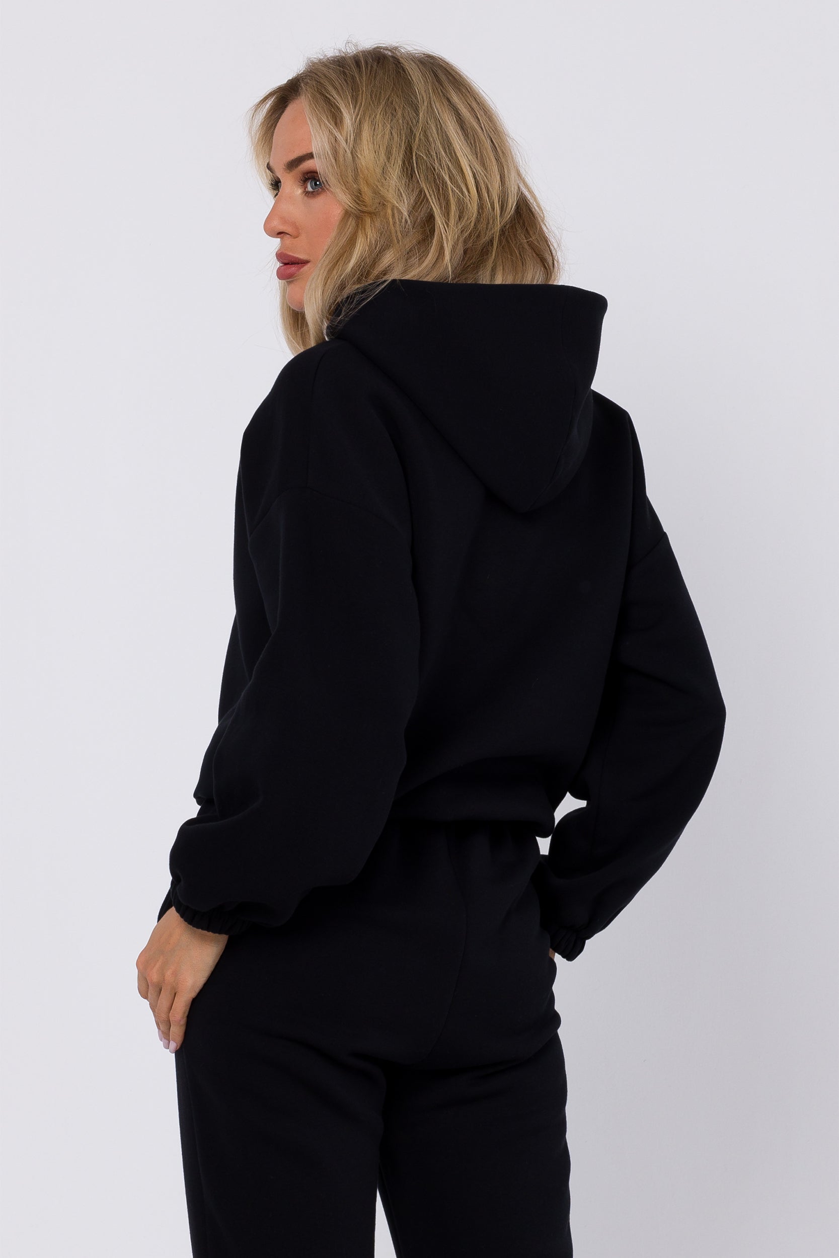 Complete your contemporary look with our Hoodie Sweatshirt Front Stitching. Crafted from luxurious knit fabric to match our Joggers Front Stitching, this hooded sweatshirt features decorative vertical stitching in the front. With long sleeves and elastic hems, it offers warmth and style. Wear it as part of a set or mix and match to make a versatile fashion statement.