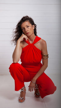 Woman wearing red jumpsuit