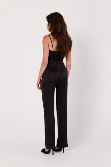 Straight Leg Black Satin Trousers | Strictly In | Discover the allure of woven satin in our straight-leg trousers. Effortlessly chic, these pants feature a front zip for a polished finish. Perfect for versatile styling, day or night.