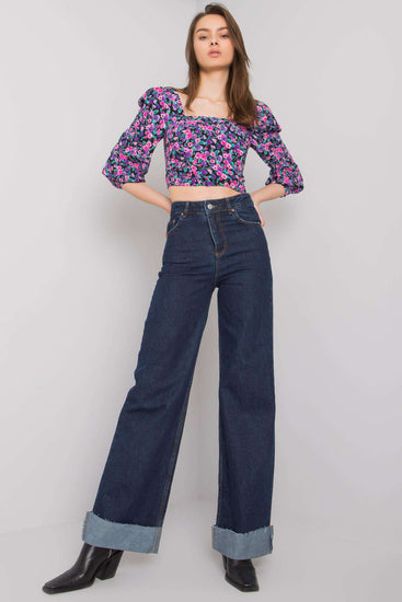 Explore the latest trend with our Turned-Up Cuffs Wide-Leg Jeans. These jeans offer a contemporary twist with stylish turned-up cuffs, combining fashion and comfort effortlessly. Elevate your wardrobe with this trendy addition today.