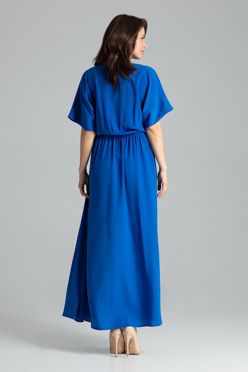 Blue maxi dress with short kimono sleeves, elastic band at the waist, and side slits.